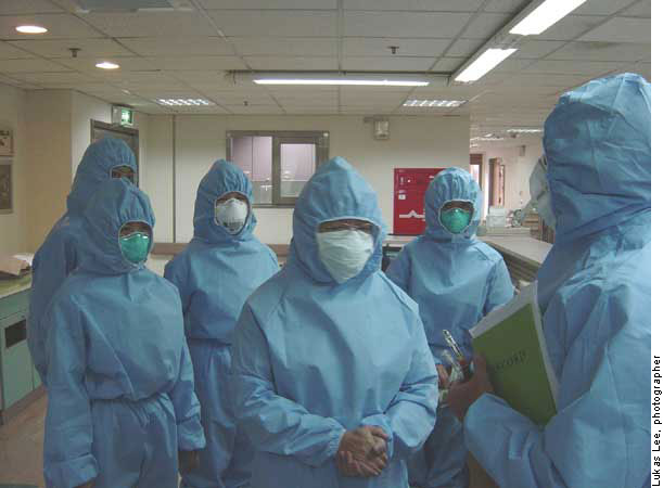 Hospital workers in Kaohsiung, Taiwan listen to a summary of findings from walkthrough survey and pressurization testing on a severe acute respiratory syndrome patient ward.